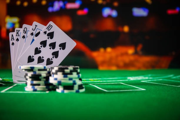 orin23 live dealer table with MotoGP odds visible on split screen